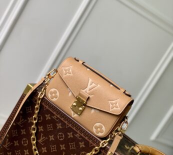 Pochette Métis East West Monogram Empreinte Leather Arizona / Crème Shoulder Bag
